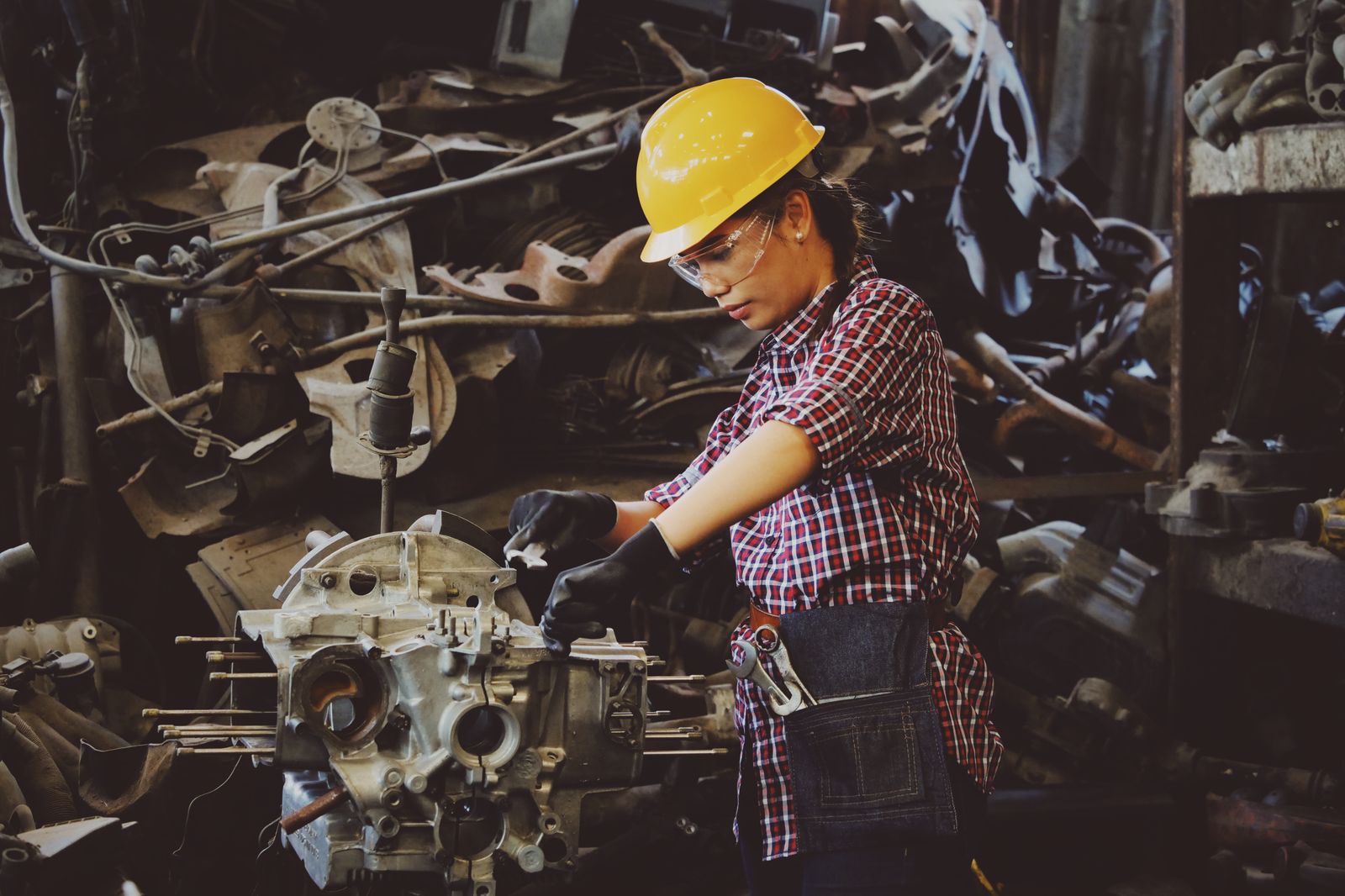 A technician working on industrial equipment